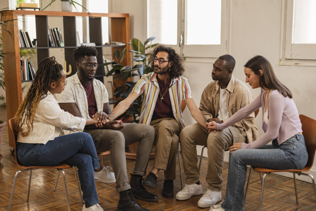 Group therapy session illustrating addiction treatment and recovery methods.