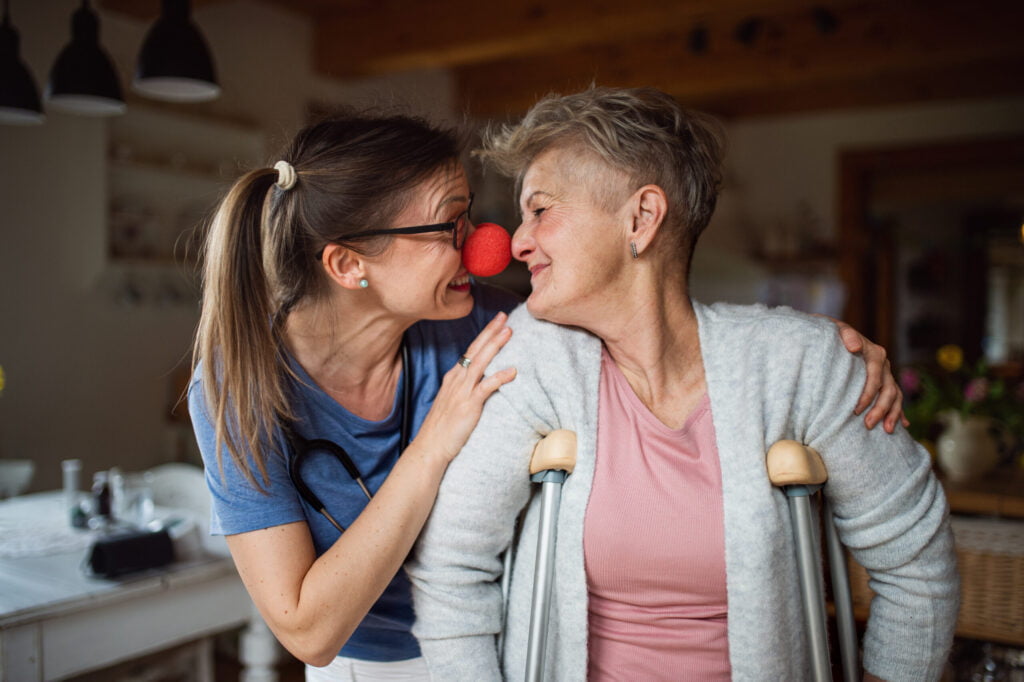 Healthcare worker and patient demonstrating empathetic understanding and communication.