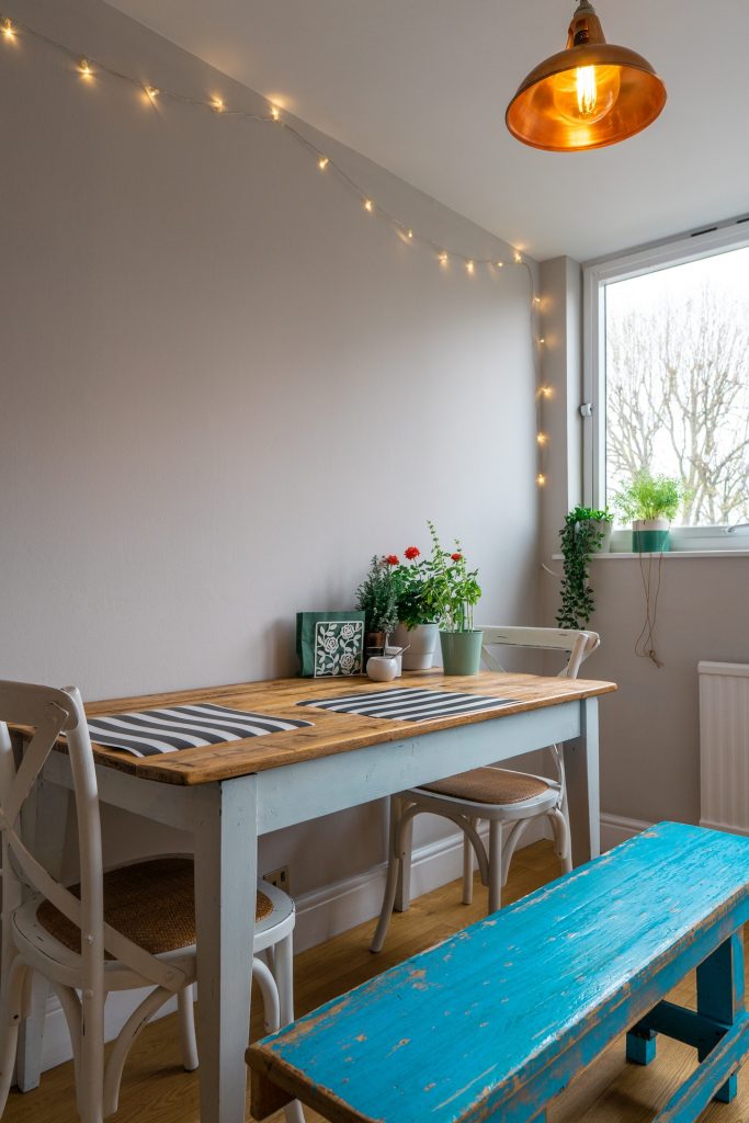 a table with a blue tablecloth