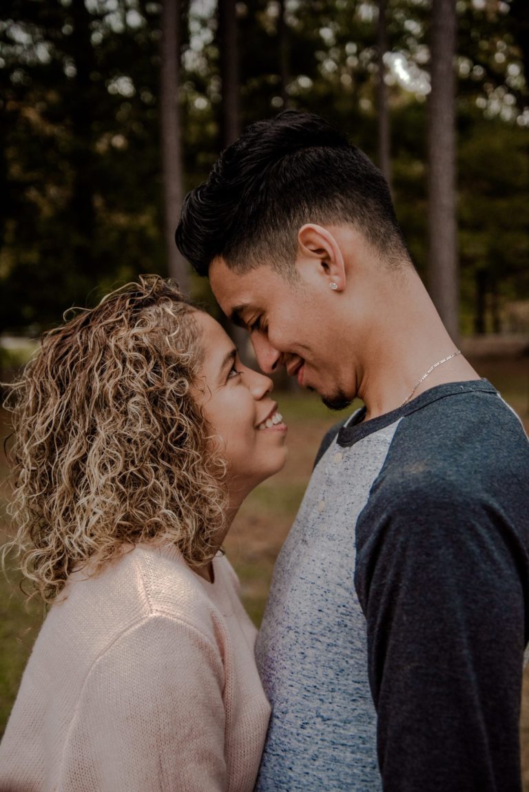 a man and woman kissing