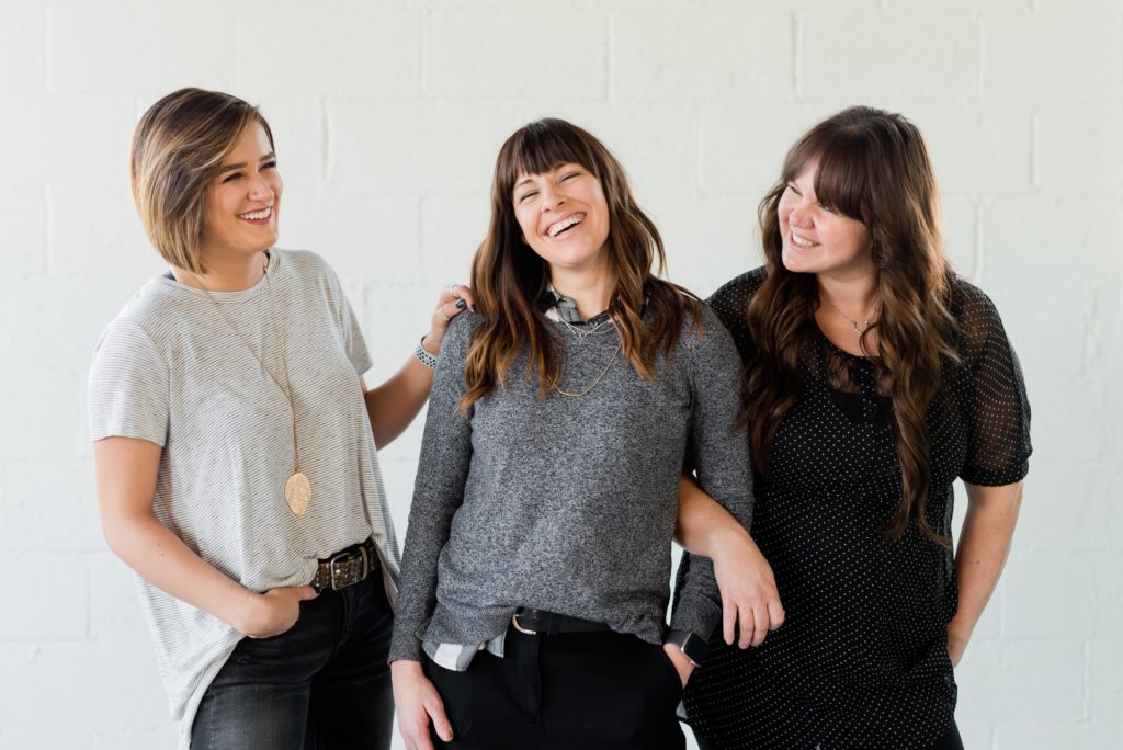 a group of women posing for a picture