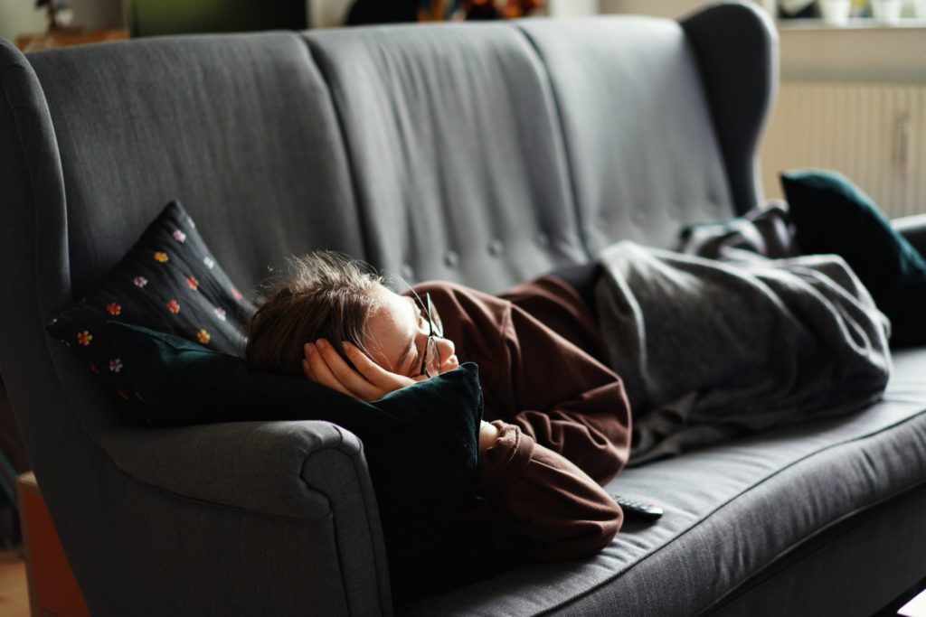 a person sleeping in a car