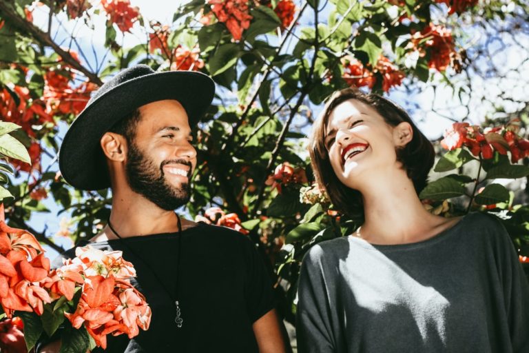 a man and a woman smiling