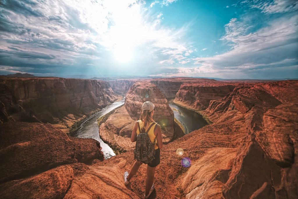 a person standing on a rock