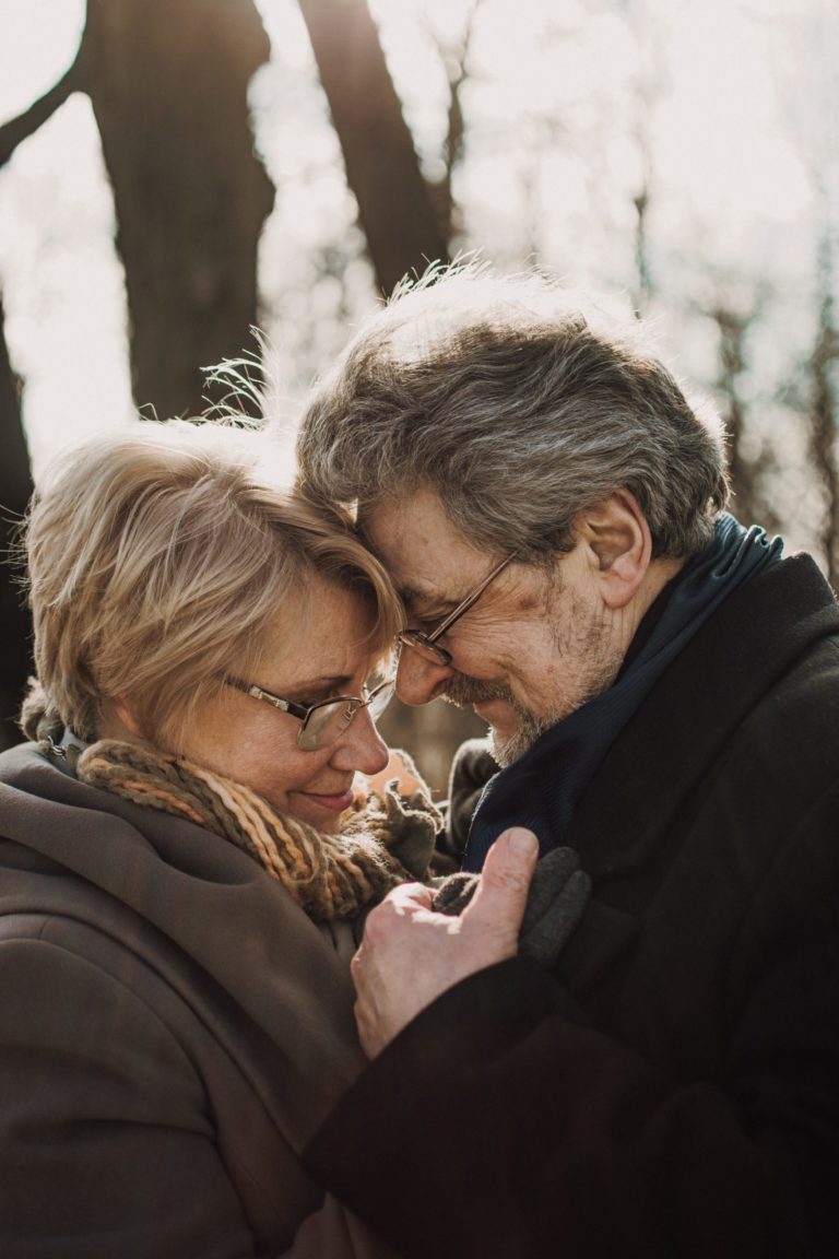 a man and woman kissing