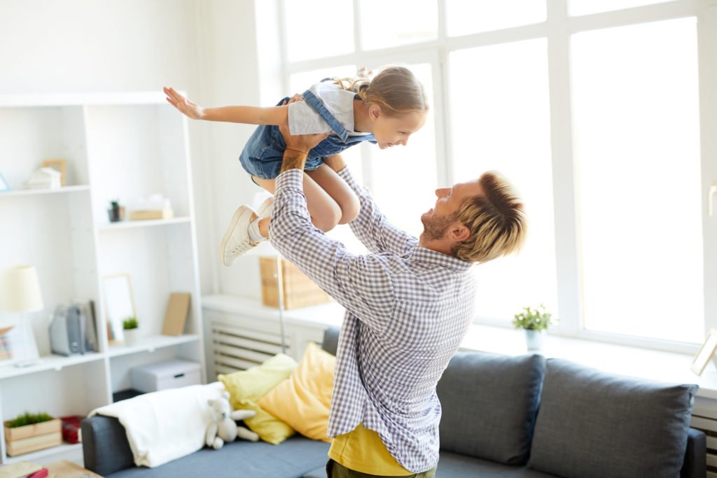 a person holding a baby