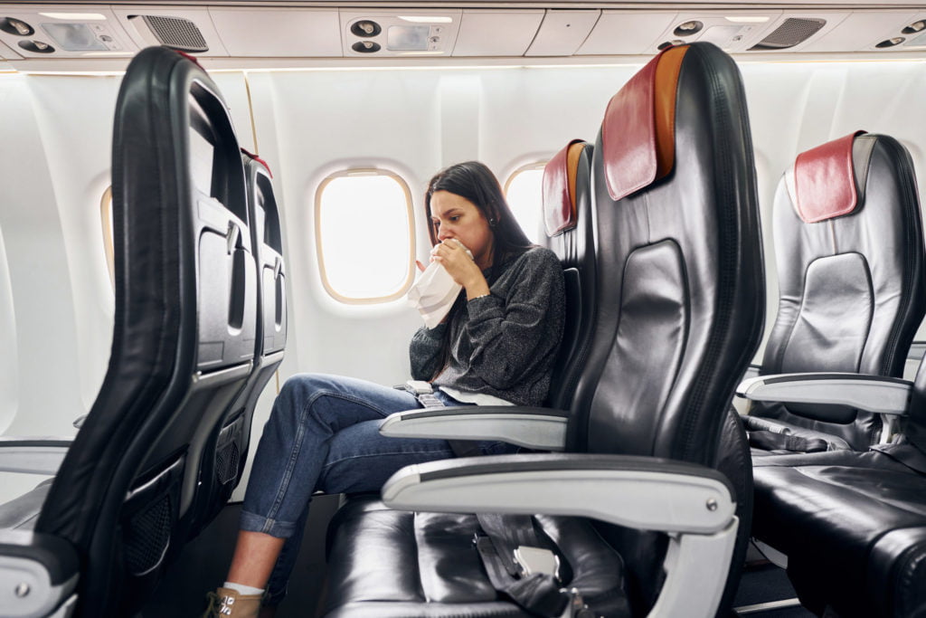 a person sitting in a plane