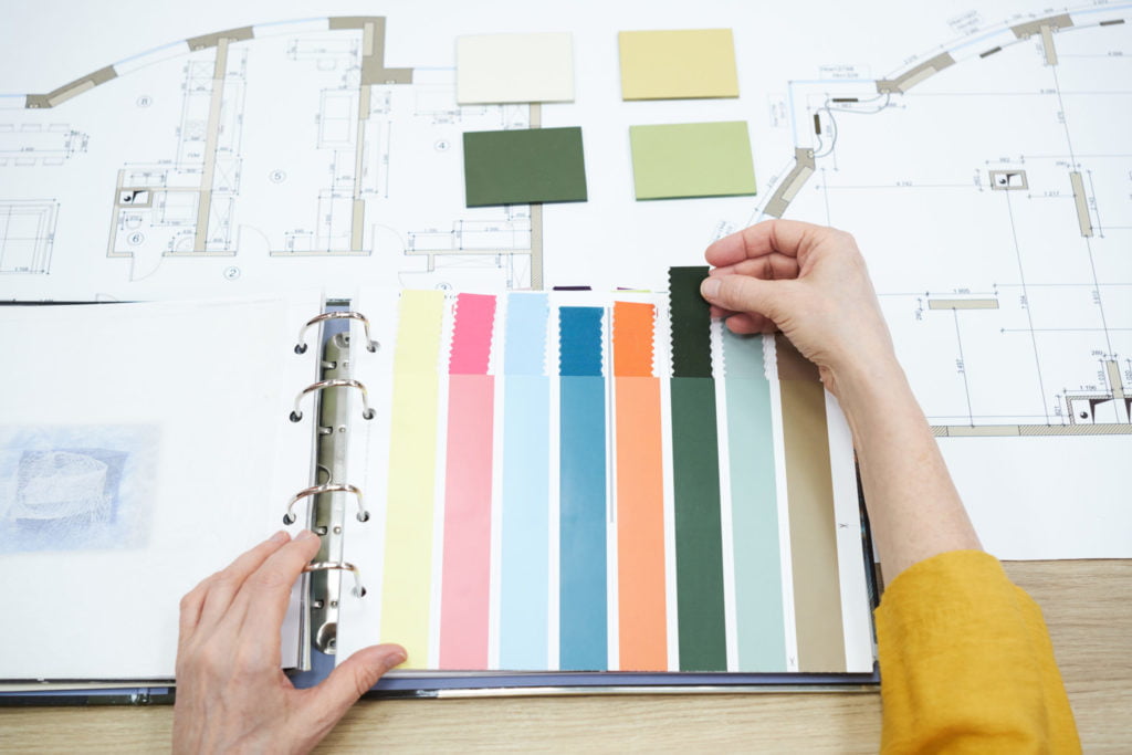 Interior designer choosing colour for project
