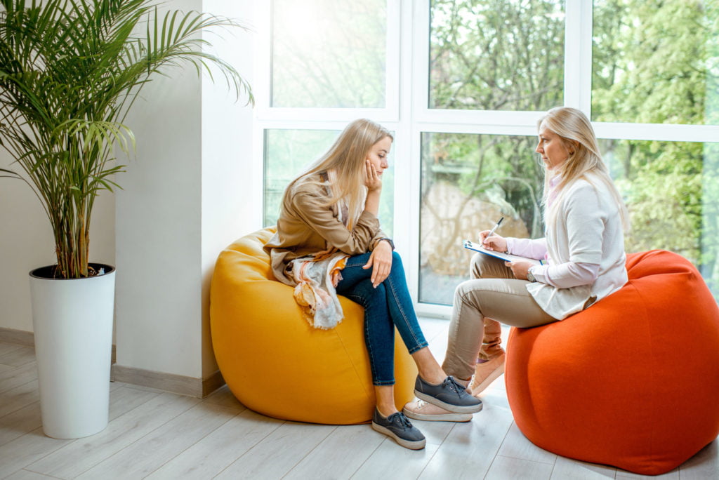life advice, woman with psychologist in the office utc scaled