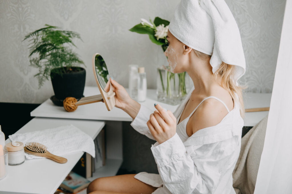 life advice, young woman in white towel chilling in bedroom and utc scaled