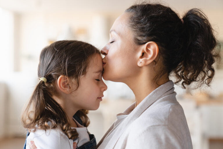home, mother kissing hugging embracing her small little utc