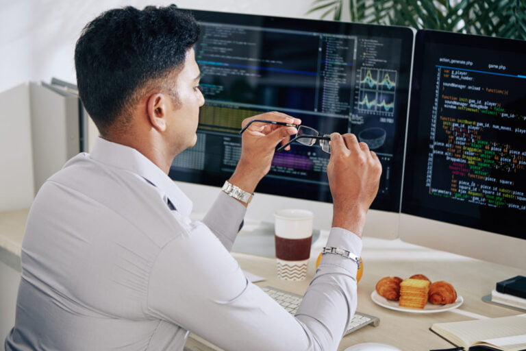 uncategorized, developer taking off glasses utc scaled