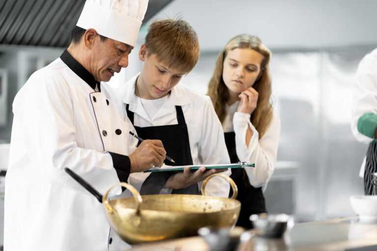 uncategorized, students are learning to cook in a culinary instit utc