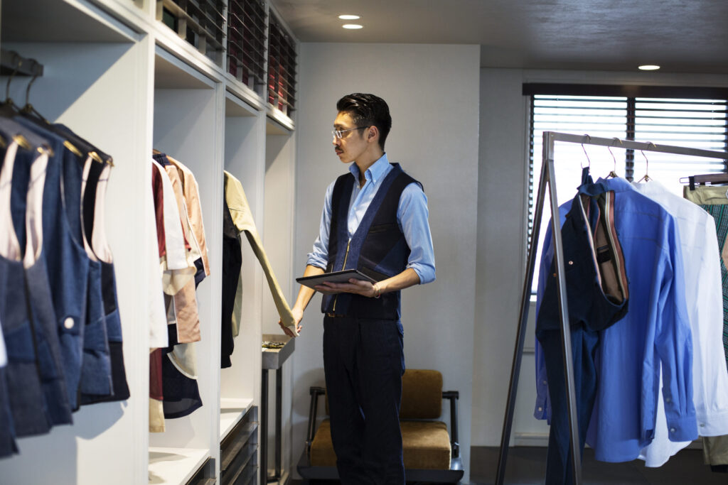 beauty, japanese salesman in clothing store looking at cl utc scaled