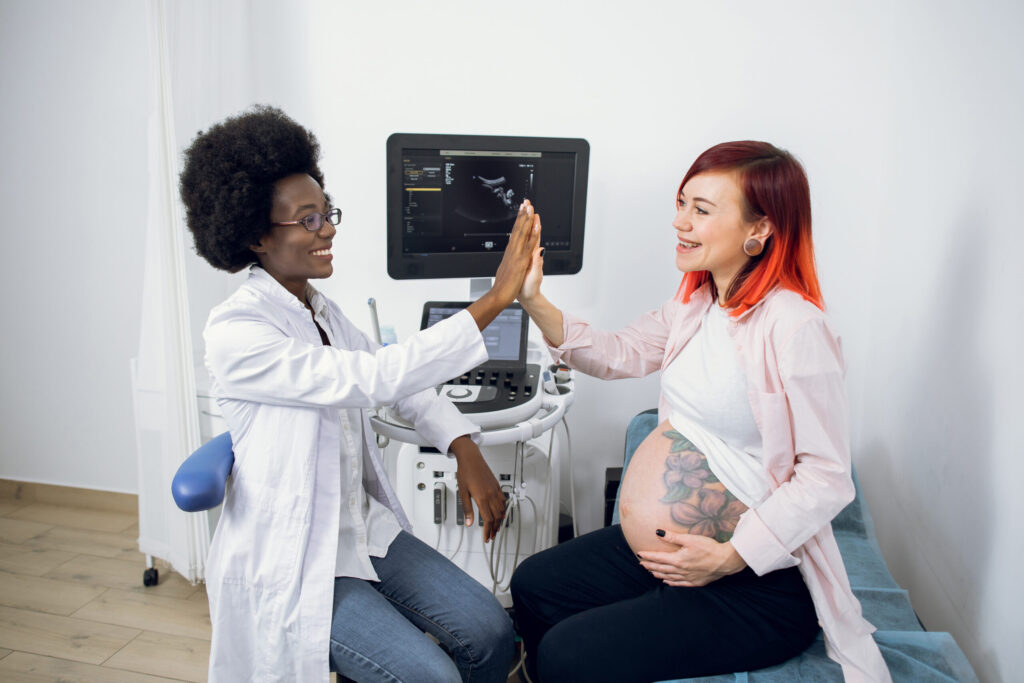 wellness, happy attractive pregnant caucasian woman patient utc scaled