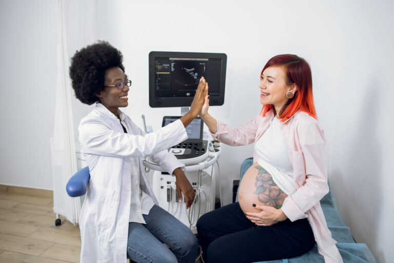 wellness, happy attractive pregnant caucasian woman patient utc scaled